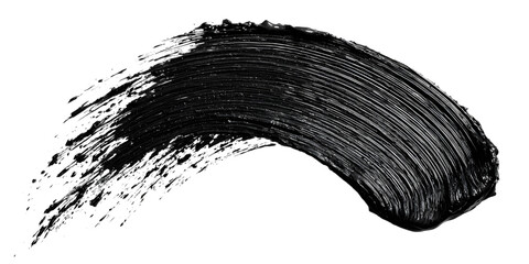 Close up of a black mascara stroke on black background.