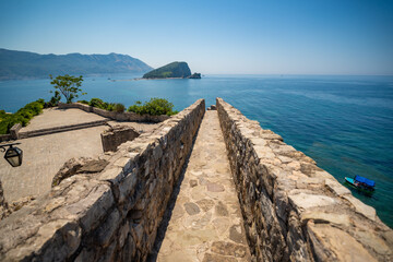 Fototapeta premium Citadel fortress and panoramic terrace in Budva, Montenegro. View of historic architecture and coastal heritage site.