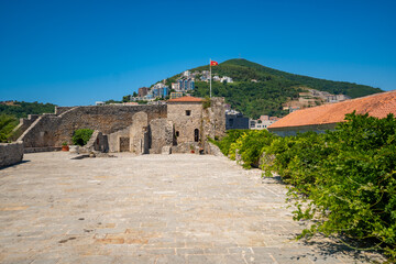 Citadel fortress and panoramic terrace in Budva, Montenegro. View of historic architecture and coastal heritage site.