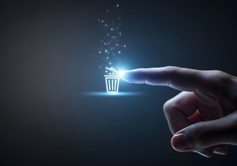 Finger pressing glowing digital trash can icon on dark background with particles