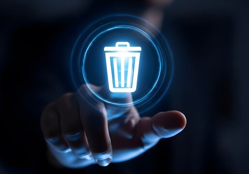 Digital trash can icon glowing on a dark background with a human finger touching it