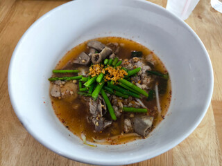 Bowl of Kway Tom yum Noodles with Pork