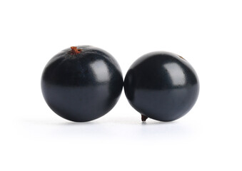 Fresh black currants on white background