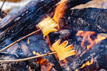 fried bacon an open fire in nature, slanina,traditional food in Romania