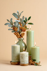 capture essence of new year  with arrangement of fragrant candles that evoke holiday warmth