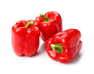 Red bell peppers on white background