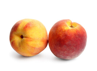 Sweet ripe peaches on white background
