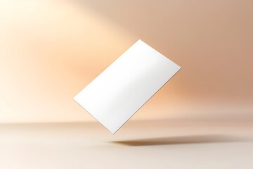 clean business card floating above neutral gradient background