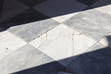 shadow on old stone floor