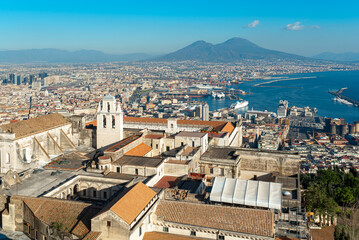 View of the city of Naples with Mount Vesuvius and the Port of Naples from the fortress of Castel Sant'Elmo. The Port of Naples is one of the largest passenger ports in Italy. 