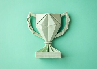 origami trophy top view on pastel green background