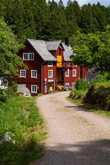 View at the old mill house by a river in a lush green forest Knared located in Southern Sweden.