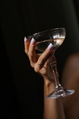 Celebrating elegance with a sparkling drink in an intimate setting