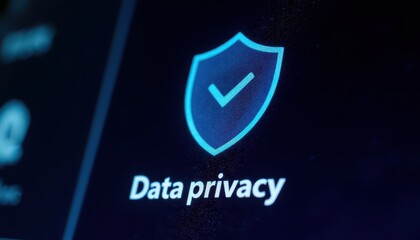 Sleek blue shield logo on a dark background, symbol of protection and security