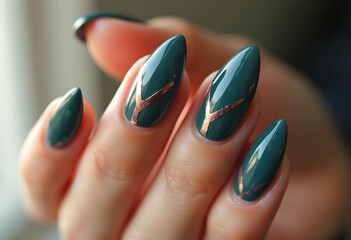 close up of a female hand holding a green glass