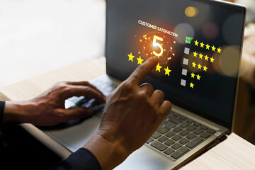 User gives rating to service experience on online application, Customer review satisfaction feedback survey concept