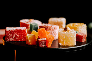 Colorful assortment of Turkish delights on display in a traditional setting for dessert lovers
