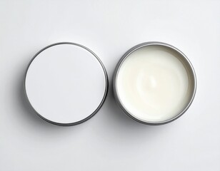 Natural skincare balm in sleek silver container for moisturizing beauty routine, promoting healthy skin and wellness