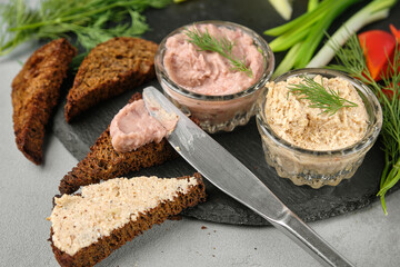 Appetizing pate with bread and fresh herbs