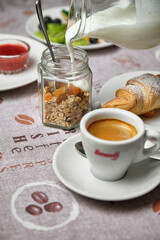 Breakfast scene with coffee and yogurt