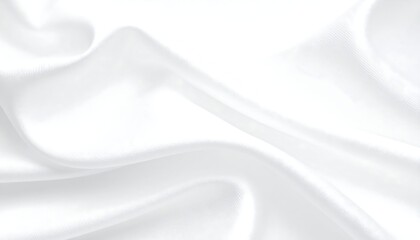 Obraz premium Close-up of smooth, flowing white fabric, revealing delicate folds and subtle shadows. The luminous material creates a soft, elegant aesthetic.