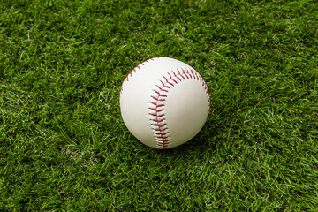 baseball ball on grass field