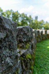 A close-up of ancient medieval castle walls from within the walls of the castle.