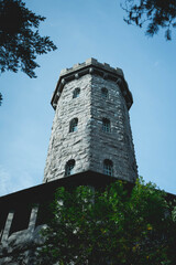 A giant watchtower from olden days still standing on a late summer day.