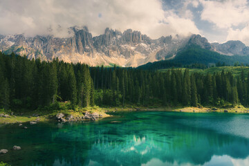 alpine lake di Carezca and mountains in Dolomites