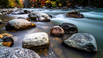Autumn river rocks.  Clear flowing water