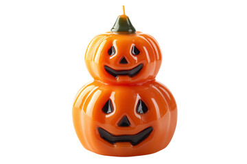 A Halloween candle shaped like a pumpkin tower, isolated on a transparent background.