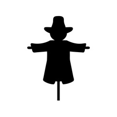 Black Silhouette of a Scarecrow with Hat and Wooden Arms