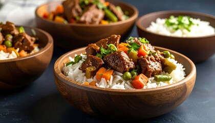 Bowls of hearty stew served over white rice, garnished with fresh herbs and colorful vegetables. Wooden bowls sit on a textured dark surface. A close-up highlights the cooked meat, carrots, and peas