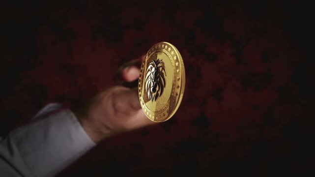 Lion power symbol rotating hand coin toss. Transaction and blockchain technology symbol throws to flip on heads or tails slowmotion 3d abstract concept.