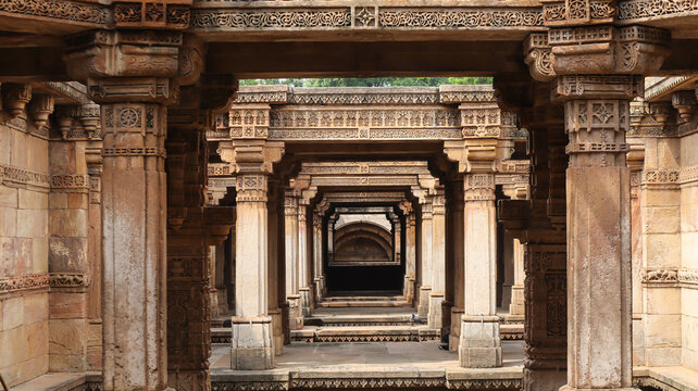 Beautiful View of Adalaj Stepwell, It was built in 1498 in the memory of Rana Veer Singh of the Vaghela dynasty,  Intricate Carvings on the Wall of Stepwell, Adalaj, Gandhinagar, Gujarat, India.