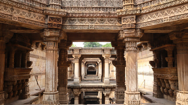 Beautiful View of Adalaj Stepwell, It was built in 1498 in the memory of Rana Veer Singh of the Vaghela dynasty,  Intricate Carvings on the Wall of Stepwell, Adalaj, Gandhinagar, Gujarat, India.
