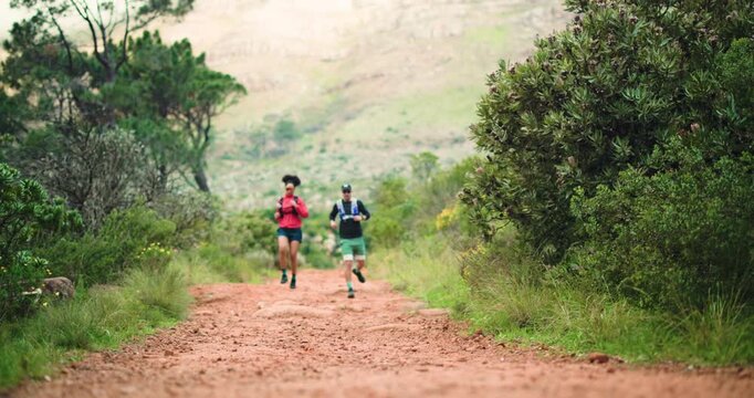 Workout, couple and running exercise on path together for outdoor fitness, challenge and benefits. Runner, man and woman in mountain for health, wellness and marathon training with cardio in nature.
