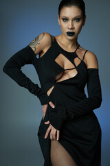 Enchanting demon woman in striking Halloween costume captures the spirit of dark elegance