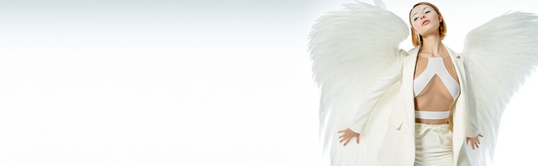 Celebrating Halloween in elegance with a beautiful angel costume and striking wings