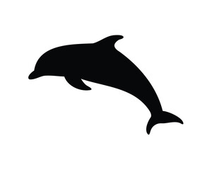 Fototapeta premium A black silhouette of a dolphin leaping out of the water gracefully