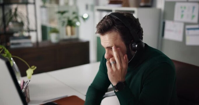 Business, man and headset in callcenter with headache, burnout or difficult customer support call. Help desk, tech and tired consultant with challenge, telecom and problem solving fail with migraine
