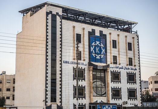 Amman, Jordan - December 23, 2015: Kamal Exchange building at Al Shareef Naser Bin Jameel Street in Amman
