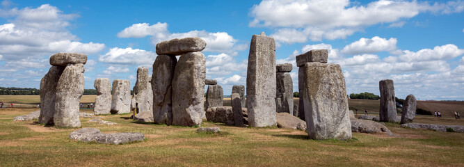 ancient ruins of stonehenge under blue sky