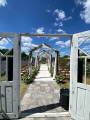Indian wedding mandap decor yellow and white flowers