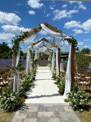 Indian wedding mandap decor yellow and white flowers