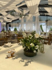 Indian wedding mandap decor yellow and white flowers