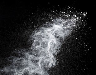 White powder explosion on black background