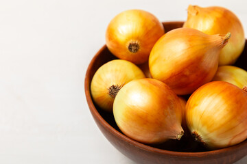 Onion on the kitchen table. onion slice. onion rings. Fresh Yellow Onion. Natural, fresh, vegetarian food. Agricultural products. Healthy eating. Vegetables. Farmer's market. Space for text.Copy space