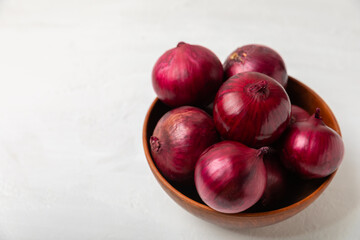 Shallot onion on the kitchen table. onion slice. onion rings. Fresh red Onion. Natural, fresh, vegetarian food. Agricultural products. Healthy eating. Vegetables. Farmer's market.