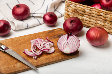 Shallot onion on the kitchen table. onion slice. onion rings. Fresh red Onion. Natural, fresh, vegetarian food. Agricultural products. Healthy eating. Vegetables. Farmer's market.